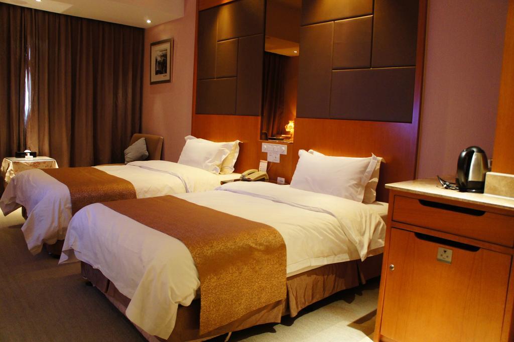 Oriental Hotel Tong Xiang Jiaxing Quarto foto
