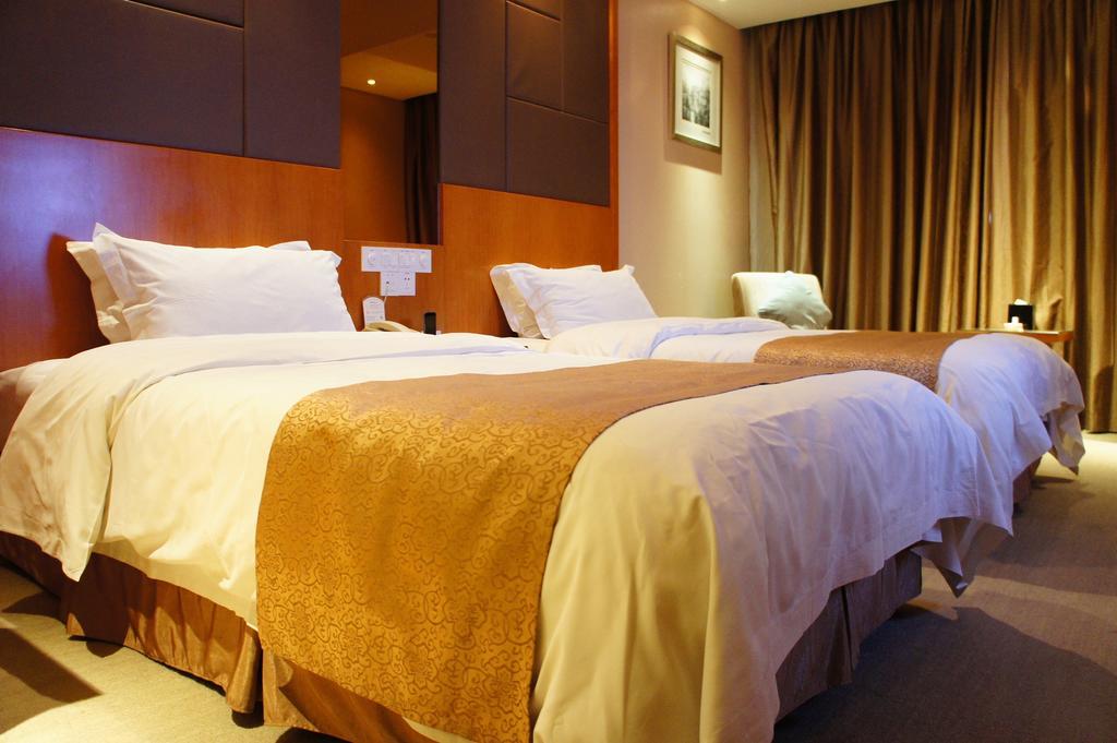 Oriental Hotel Tong Xiang Jiaxing Quarto foto